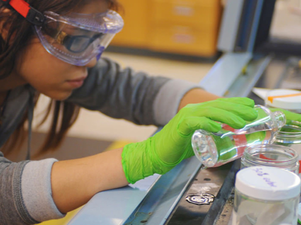 chemistry student in lab